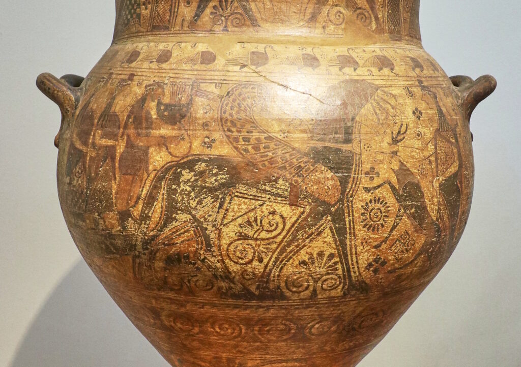 Detail of cycladic krater from 7th century BCE depicting Artemis, holding a deer, welcoming Apollo on his return to Delos.